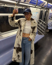 Dallas Faux Fur Cow Print Coat – Cozy Longline Jacket for Bold Fashion Statements