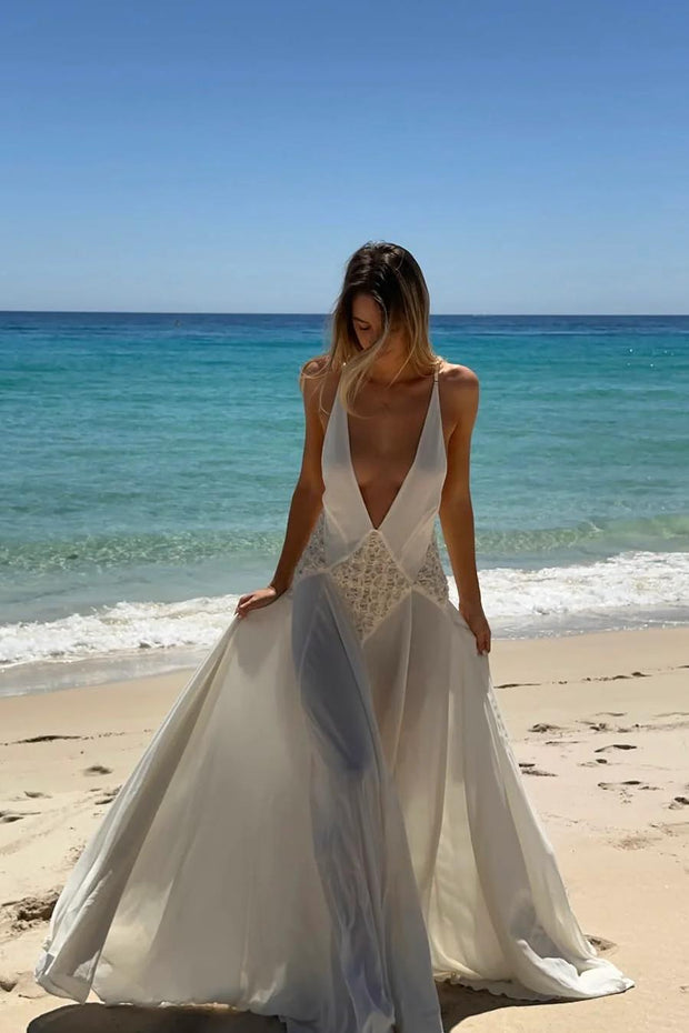 Elegant Women's Black Maxi Dress with Plunging V-Neckline and Open-Back Design – Size M