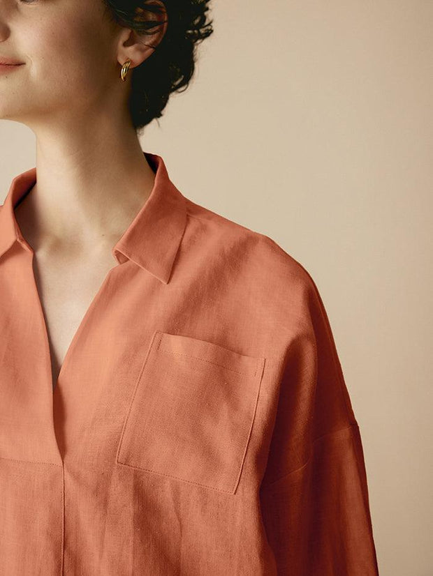Oversized Women's Linen Shirt with V-Neck, Rounded Hem, and Side Pockets for Effortless Style