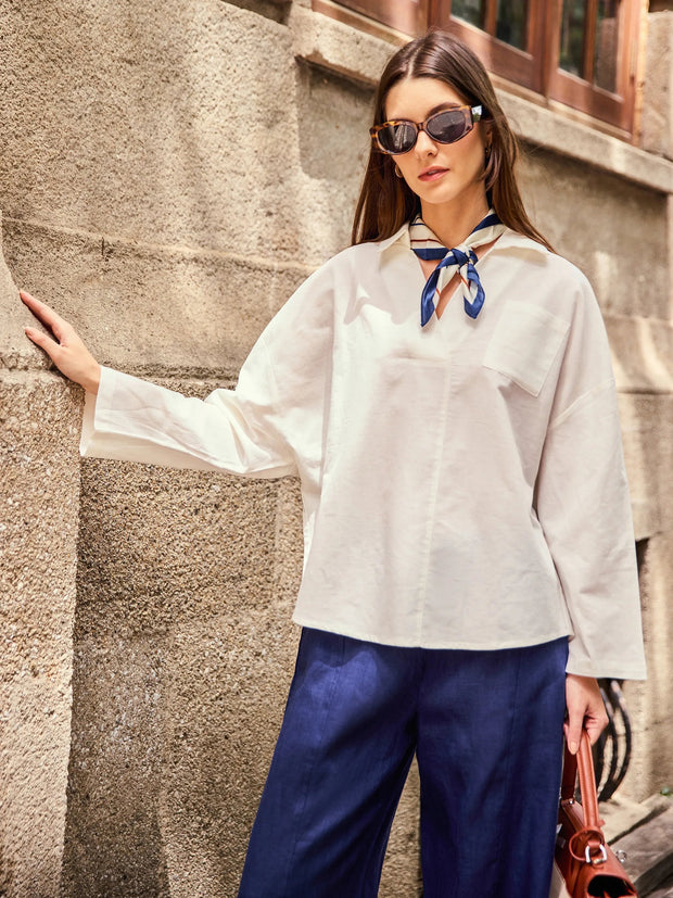 Oversized Women's Linen Shirt with V-Neck, Rounded Hem, and Side Pockets for Effortless Style