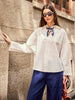 Oversized Women's Linen Shirt with V-Neck, Rounded Hem, and Side Pockets for Effortless Style