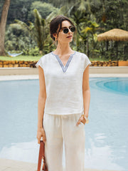 White Linen V-Neck Crop Top for Women with Geometric Trim and Pleated Curved Hemline